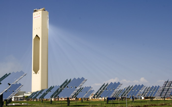 The PS10 concentrated solar power tower and its field of heliostat mirrors in Spain.